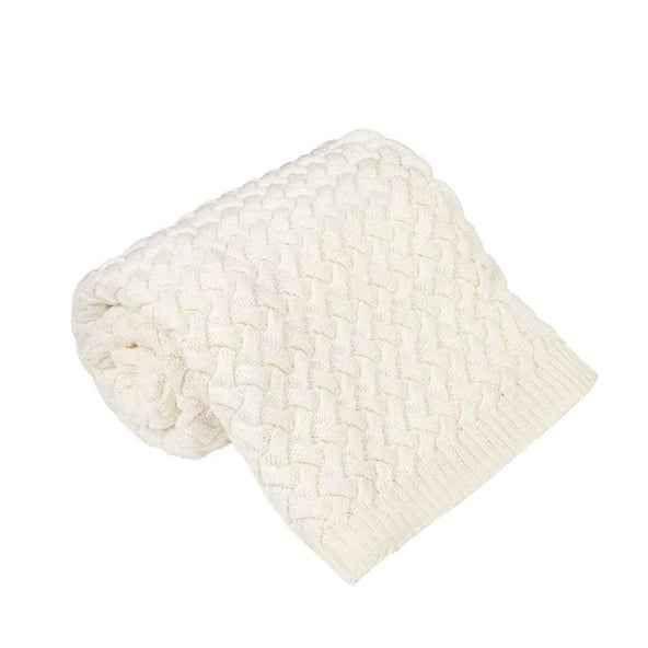 white knitted blanket on a white background