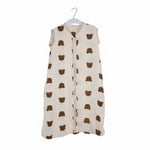 Baby Natur cream muslin sleeveless sleeping bag with brown bear print. Zipper closure.