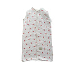 Baby Natur sleeveless sleeping bag with a white background and a red cherry print. Made from soft, breathable cotton.