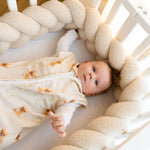 Baby Natur sleeveless sleeping bag in cream with a cute dog print, made from soft, breathable cotton for safe and comfortable sleep.