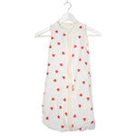 Baby Natur white sleeveless sleeping bag with red hearts pattern, made of soft, breathable cotton.