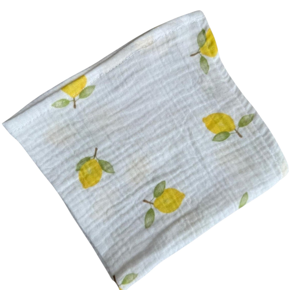 Baby Natur white muslin cloth with yellow lemon print, perfect for wiping and washing.