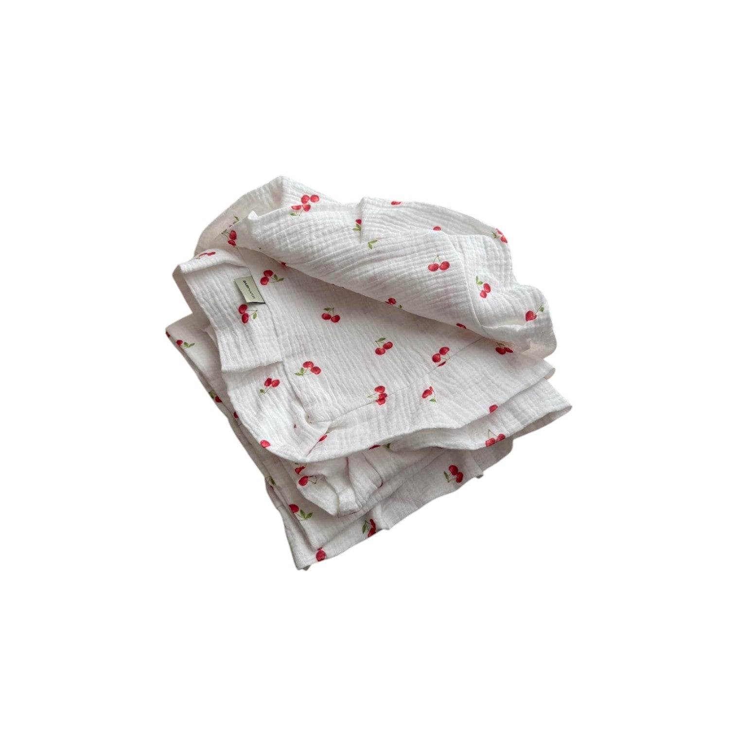 Baby NaturMuslin double-layer blanket with a white background and a red cherry print. Soft and gentle for baby's skin.